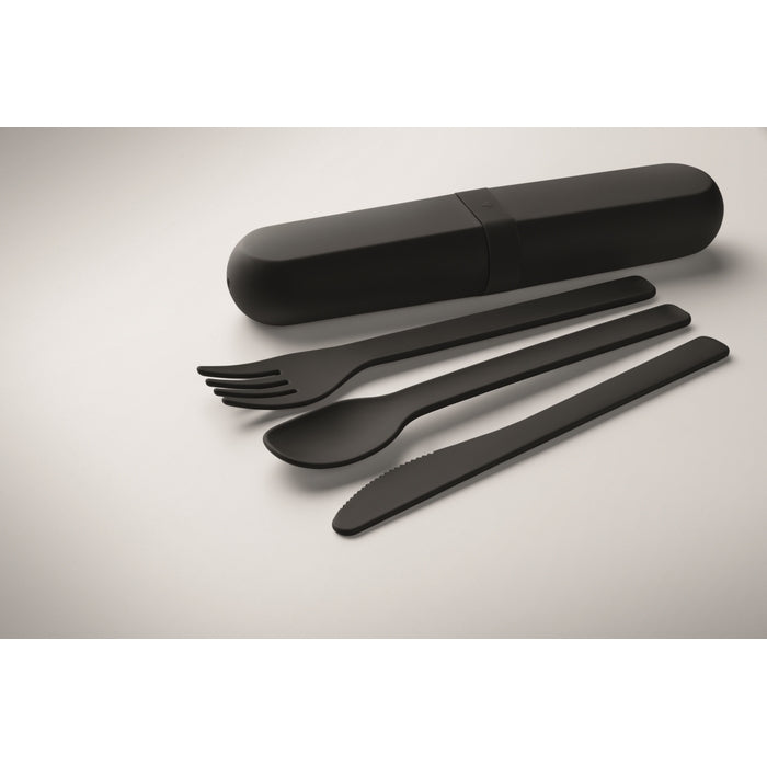 Black silicone travel utensil set with a cylindrical case, including a fork, spoon, and knife, displayed on a light gray background.